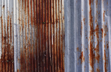 Rusty corrugated metal wall texture background