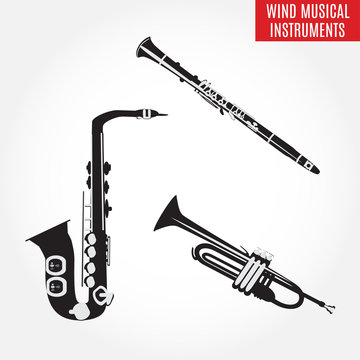 Set of black and white wind musical instruments, vector illustration.