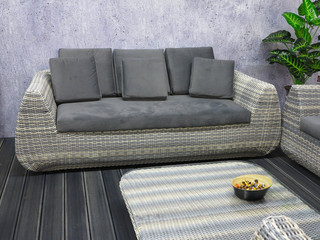 Modern gray sofa in minimalism style interior design