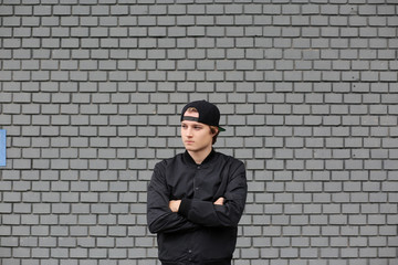 Attractive teenage boy in urban background