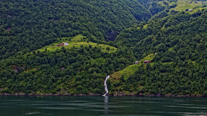 Early morning view of small remote farms in the beautiful Geiranger Fiord in Norway