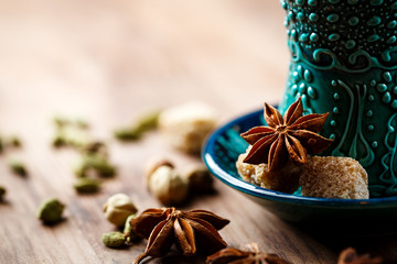 Hot drink with spices in authentic cup