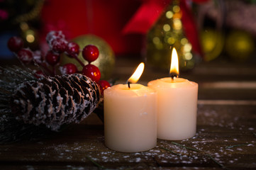 Obraz na płótnie Canvas Christmas decoration with candles over dark background