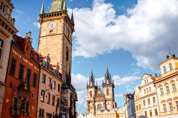 Fototapeta na wymiar Cityscape view on the clock tower and Tyn cathedral in the old town of Prague