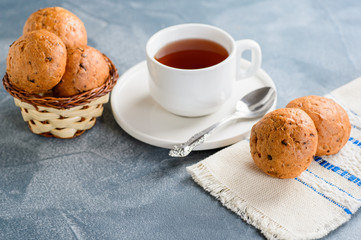 Homemade buns and a cup of tea on the table