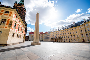 Courtyard with obelisk near Vitus cathedral in the old town of Prague