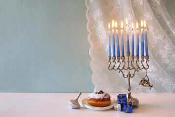 jewish holiday Hanukkah background with menorah © tomertu