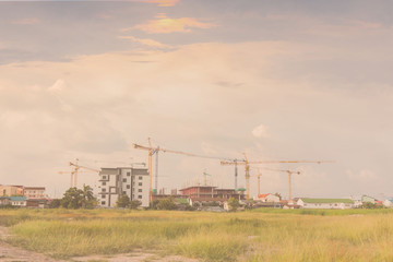 Fototapeta na wymiar crane and construction plant.Tower Crane in Construction,Silhoue