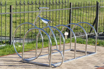 Fototapeta na wymiar Original bicycles parking on the streets of Kaliningrad