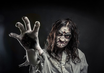 Zombie woman with bloody face