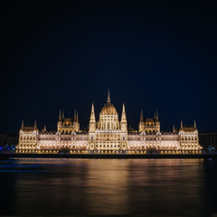 Fototapeta na wymiar View of the Parliament in Budapest nicely illuminated at night