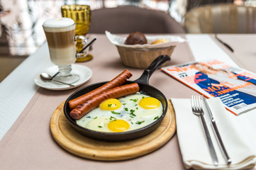 scrambled eggs with sausages