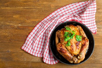 baked chicken,Style rustic.Top view, space for text.