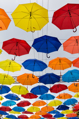 Colorful umbrellas in the sky