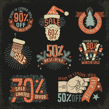 Christmas discount New Year sale - vintage retro posters, signs, logos on a black background. Vector illustration layered.