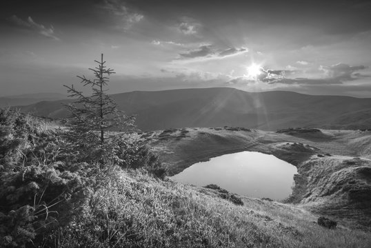 Fototapeta Lake in a mountains. Monochrome