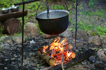 smoked tourist kettle on hot fire