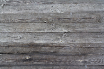 Old cracked board fence. Backgrounds and textures