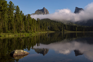 Mountain Lake with rocks in the foreground. Lake Bright, Natural Park Ergaki, Western Sayan...