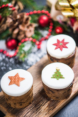 Traditional Christmas fruit rich cakes with decoration