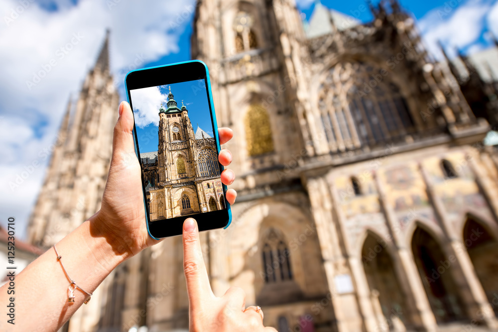 Wall mural Photographing with phone famous Vitus cathedral in Prague city