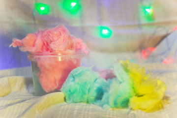 colorful cotton candy in a bucket close up