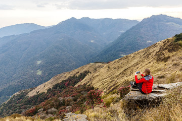 Fototapeta premium Young hiker tourist taking photo