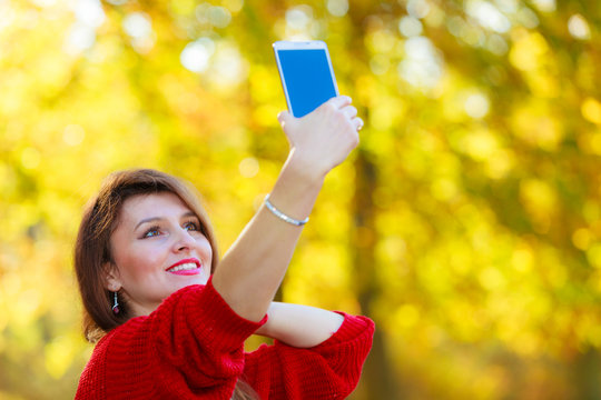 Gorgeous girl taking selfie.
