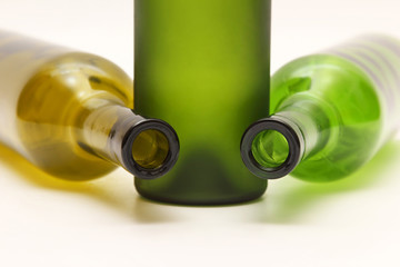 empty bottles of wine on white background