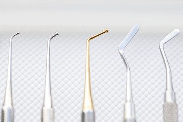 Dental cavity filling instruments
