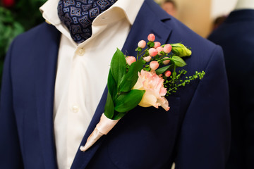 Wedding boutonniere on suit of  groom