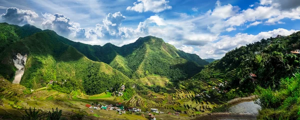 Poster Amazing panorama view of rice terraces fields in Ifugao province mountains under cloudy blue sky. Banaue, Philippines UNESCO heritage © PerfectLazybones