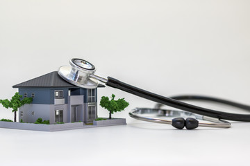 house building and stethoscope, home inspection concept