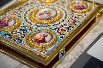 Bible in the Orthodox Church prepared for baptism ceremony in the Romanian Church