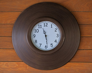 Classic  clock on vintage wall.