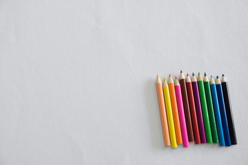 Top view of Blank paper and colorful pencils, creative or home w