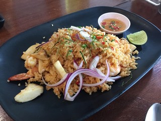 Shrimp tom yam fired rice on black dish