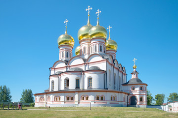 Fototapeta na wymiar Cathedral of the Icon of the Mother of God Iverskaya close up in the sunny July afternoon. Valdai Iversky Svyatoozersky Bogoroditsky monastery, Russia