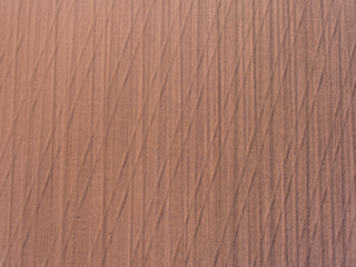 Empty plowed farm field brown color background