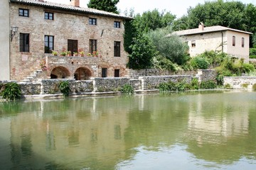 Obraz premium the square of Bagno Vignoni, built around a fountain of hot thermal water 