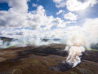 Smoke coming from burning heather, taken from the above.