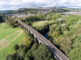 Fototapeta na wymiar Views over New Mills, Derbyshire with railway bridge