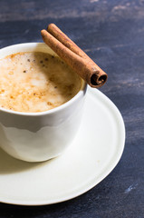 Cup of cappuccino with festive decor