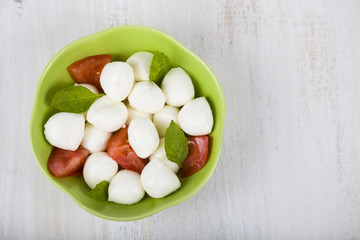 Caprese salad on a wooden table