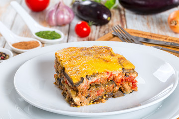 portion of delicious moussaka decorated with parsley
