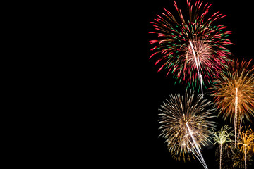 Fototapeta premium colourful fireworks for celebration on dark background