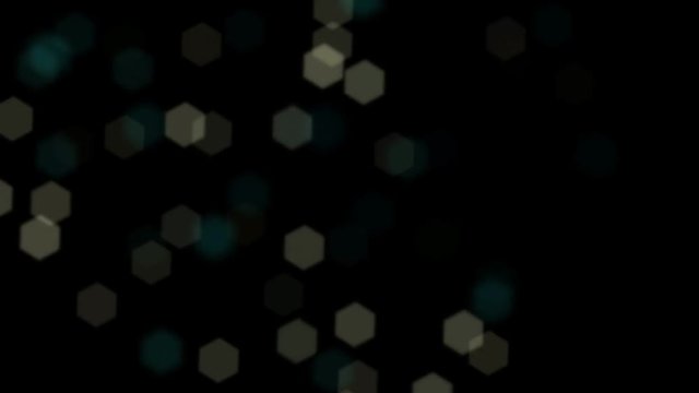 Flashing Lens Hexagon Bokeh Flying Around on a Black Background