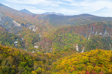 Fototapeta premium Mt.Nantai surrounded by autumn colours in Autumn