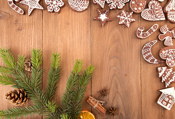 Christmas gingerbread cookies on old wooden table.