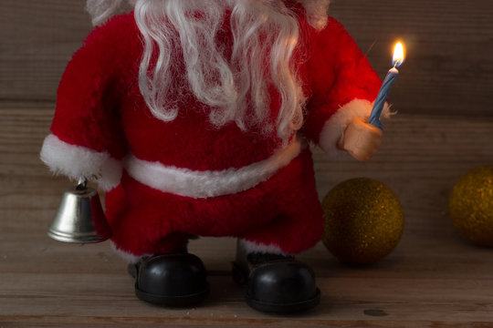 andle in hand of Santa Claus